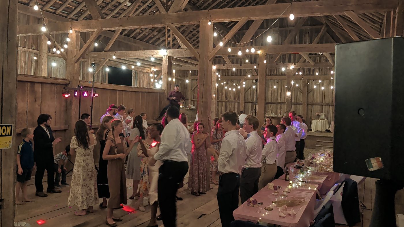 Connor O'Donohue DJing a barn wedding reception in Michigan