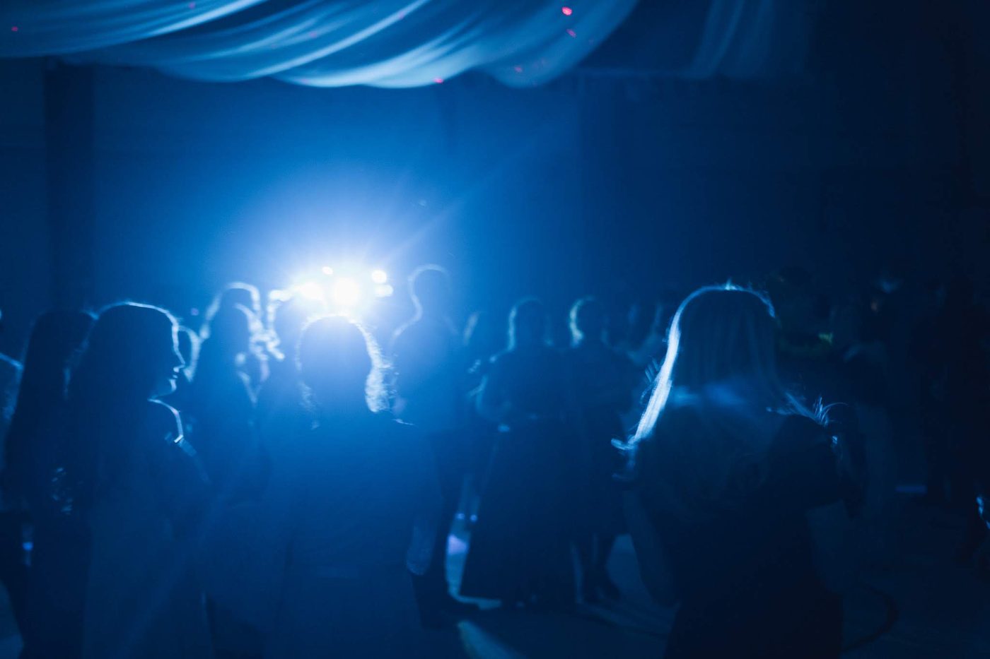 Packed wedding dance floor with blue lighting — O'Donohue Wedding Music Michigan