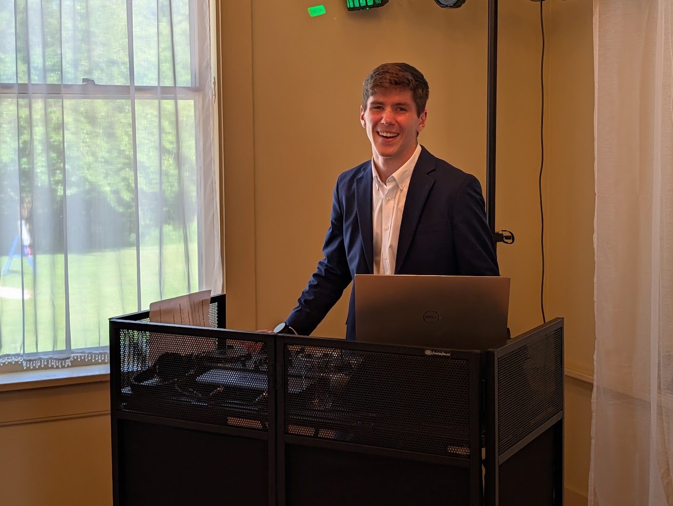 Connor O'Donohue at the DJ booth at a Michigan wedding